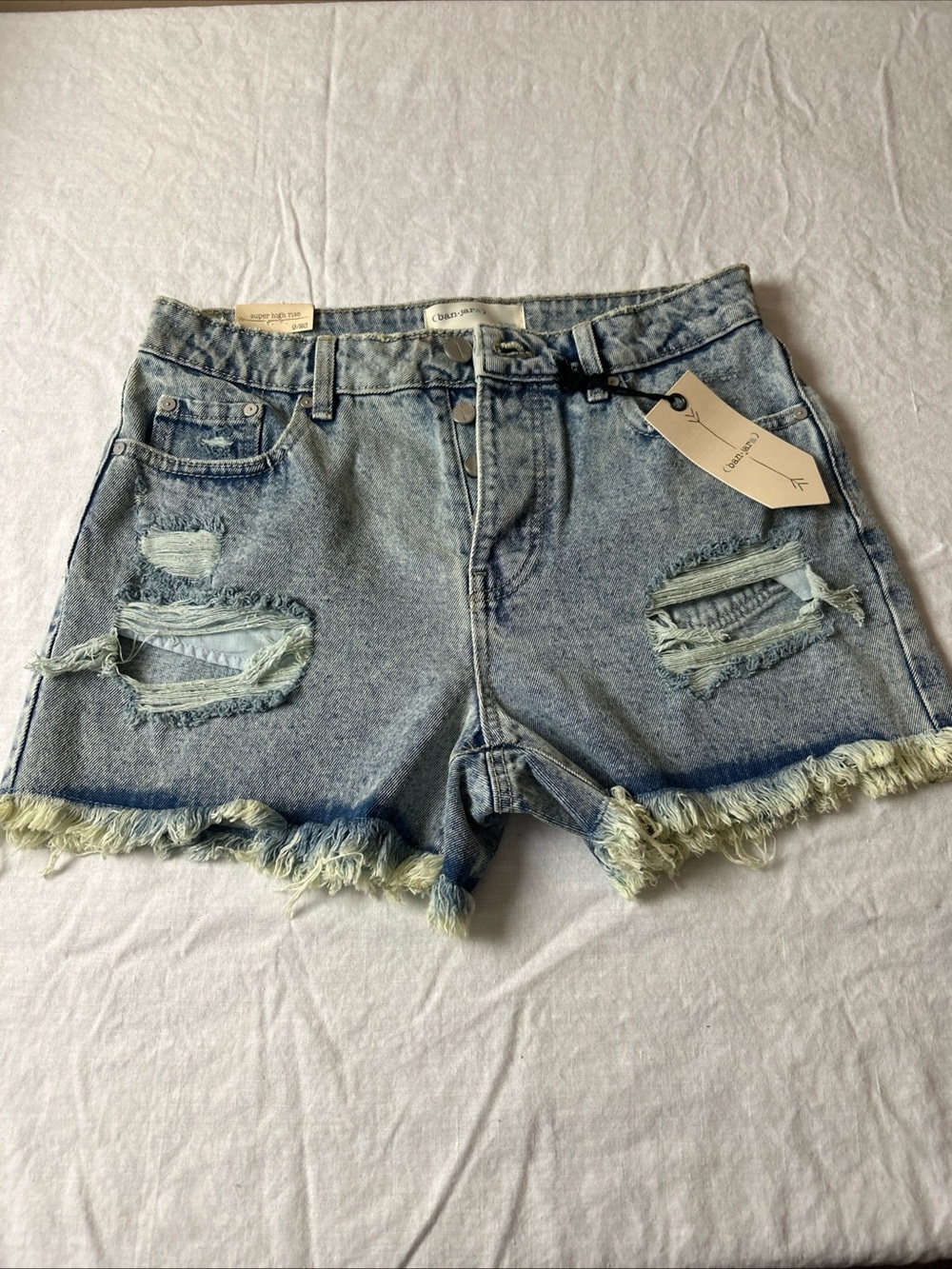 Distressed Light Blue Denim Shorts with Frayed Hem